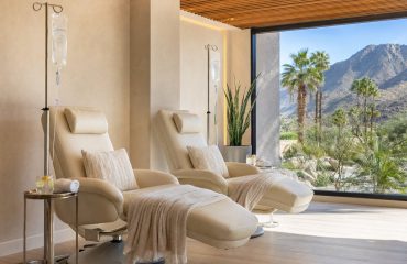 IV vitamin therapy lounge with recliners and desert views