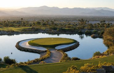 Island green par 3 at The Golf Club at Terra Lago with panoramic Coachella Valley views, Indio