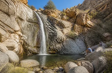 Seasonal waterfall at the end of a rocky desert canyon