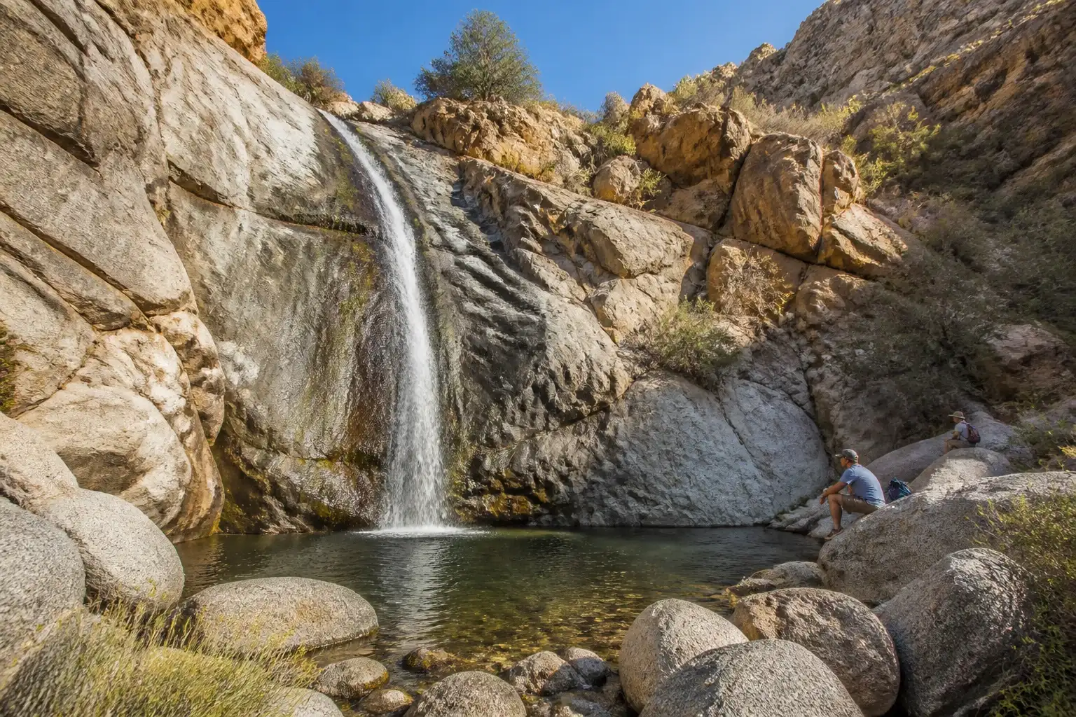 Seasonal waterfall at the end of a rocky desert canyon